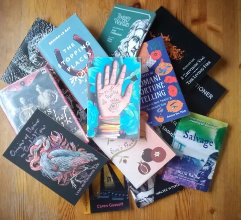 Photo of a stack of books.
