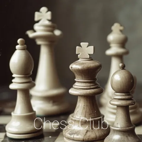image of chess pieces with text displaying "Chess Club"