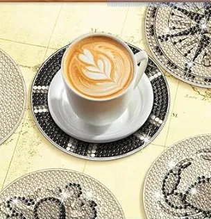 Image of a cup of coffee on a coaster plus other nautical themed coasters