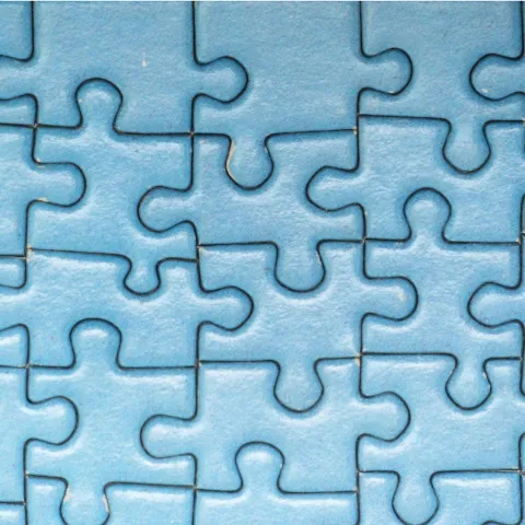 An image of a solid blue jigsaw puzzle