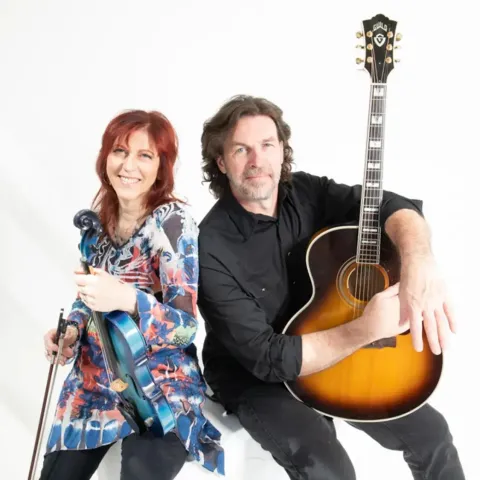 An image of the musical duo, Deni Bonet and Chris Flynn