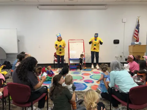 storytellers before crowd