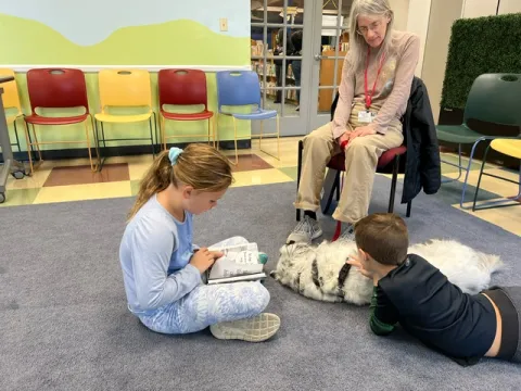 Rosie with students.