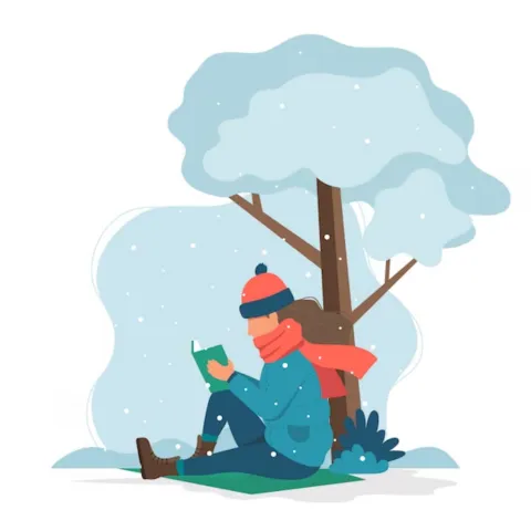 person reading under a tree