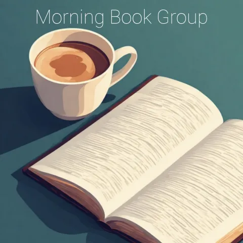 Picture of an open book next to a cup of coffee