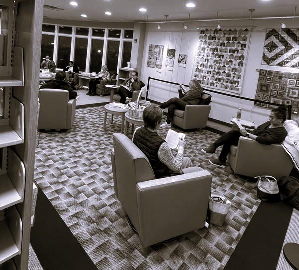 Photograph of a Silent Book Club meeting at the library
