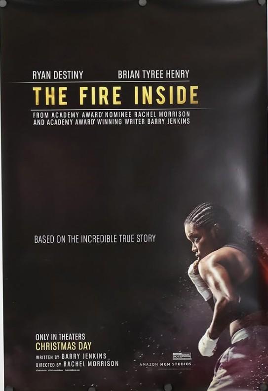The Fire Inside's DVD cover shows a young woman boxer